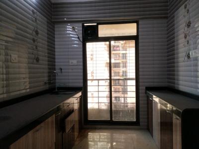 Kitchen Image of 1000 Sq.ft 2 BHK Apartment / Flat for sale in Nisarg Hyde Park, Kharghar Navi Mumbai for Rs. 13100000