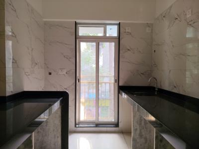 Kitchen Image of 596 Sq.ft 1 BHK Apartment / Flat for sale in Ashtha Pushp, Andheri East Mumbai for Rs. 13800000