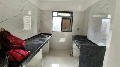 Kitchen Image of 700 Sq.ft 2 BHK Apartment / Flat for sale in D G S Sheetal Hira, Malad East Mumbai for Rs. 16000000