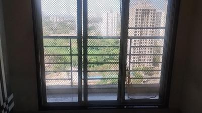 Bedroom Image of 695 Sq.ft 1 BHK Apartment / Flat for sale in Bhoomi Lawns Phase II, Shilgaon Thane for Rs. 3900000