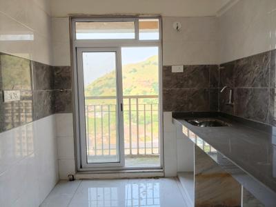 Kitchen Image of 691 Sq.ft 1 BHK Apartment / Flat for sale in Pushpak Nagar Navi Mumbai for Rs. 5950000