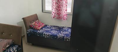 Bedroom Image of Om Sai PG in Ghorpadi, Pune