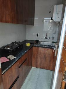 Kitchen Image of 600 Sq.ft 2 BHK Builder Floor for rent in Sector 8 Rohini New Delhi for Rs. 30000