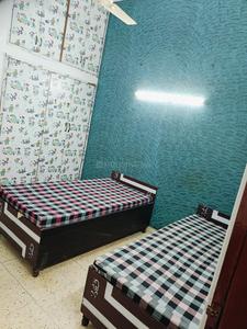 Bedroom Image of Sweet Home PG  in Sector 18, Noida