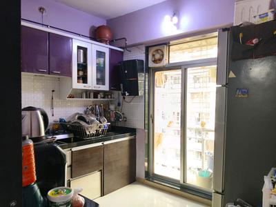 Kitchen Image of 825 Sq.ft 1.5 BHK Apartment / Flat for sale in AMMBER ENNCLAVE, Thakurli Thane for Rs. 7000000