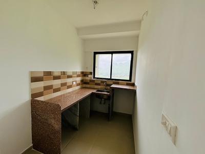 Kitchen Image of 550 Sq.ft 1 BHK Apartment / Flat for sale in Wadhwa Wise City, Chikhale Navi Mumbai for Rs. 5400000