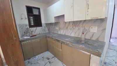 Kitchen Image of 915 Sq.ft 3 BHK Builder Floor for rent in Palam New Delhi for Rs. 25000