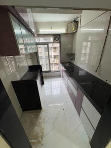 Kitchen Image of 700 Sq.ft 2 BHK Apartment / Flat for rent in Paradigm Ananda Residency, Borivali West Mumbai for Rs. 55000
