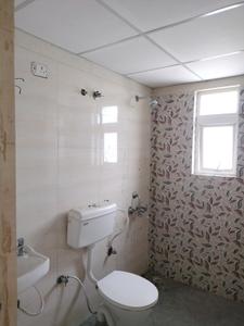 Common Bathroom One Image of 1446 Sq.ft 4 BHK Apartment / Flat for sale in Advitya Homes, Kail Gaon Faridabad for Rs. 9500000