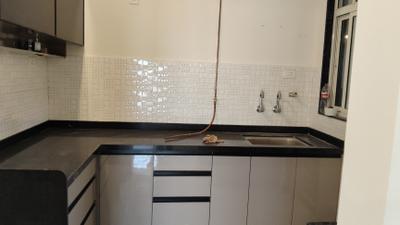 Kitchen Image of 880 Sq.ft 2 BHK Apartment / Flat for rent in Basil Mondale, Mundhwa Pune for Rs. 30000