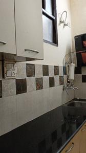 Kitchen Image of 700 Sq.ft 1 BHK Builder Floor for rent in Sector 30 Gurgaon for Rs. 25000