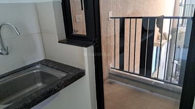 Kitchen Image of 950 Sq.ft 2 BHK Apartment / Flat for rent in Mahindra Nestalgia, Pimpri Pune for Rs. 35000
