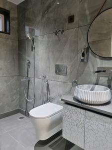 Common Bathroom Image of 900 Sq.ft 3 BHK Apartment / Flat for sale in Janakpuri New Delhi for Rs. 14000000