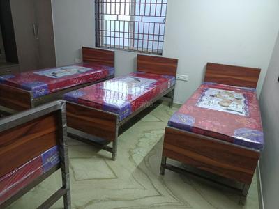 Bedroom Image of Sri Venkateshwara Ladies PG in Ambattur Industrial Estate, Chennai