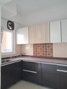 Kitchen Image of 1075 Sq.ft 2.5 BHK Apartment / Flat for sale in Amrapali Zodiac, Sector 120 Noida for Rs. 10300000