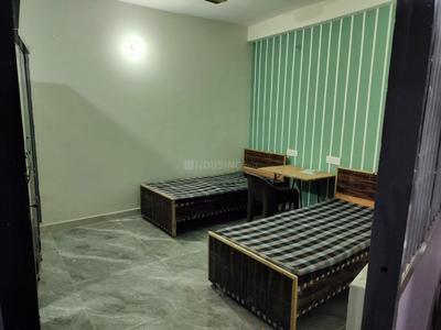 Bedroom Image of raj pg in Sector 22, Noida