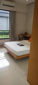 Bedroom Image of 1060 Sq.ft 2 BHK Apartment / Flat for sale in Majestique Rhythm County, Handewadi Pune for Rs. 5300000