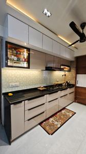 Kitchen Image of 2025 Sq.ft 3 BHK Apartment / Flat for sale in Dev Aalay, Sargasan Gandhinagar for Rs. 12000000