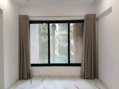 Living Room Image of 660 Sq.ft 1 BHK Apartment / Flat for sale in Unique Poonam Estate Cluster 1, Mira Road East Mira Bhayandar for Rs. 7500000