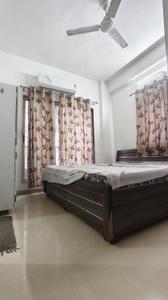 Bedroom Image of 910 Sq.ft 1 BHK Apartment / Flat for rent in Makarba Ahmedabad for Rs. 22000