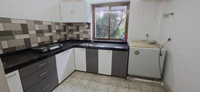 Kitchen Image of 650 Sq.ft 1 BHK Apartment / Flat for rent in Sangamvadi Pune for Rs. 32000