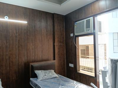 Bedroom Image of 400 Sq.ft 1 RK Builder Floor for rent in Sector 15 Gurgaon for Rs. 18000