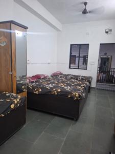 Bedroom Image of Jai Ambe Boys PG in Chanakyapuri, Ahmedabad