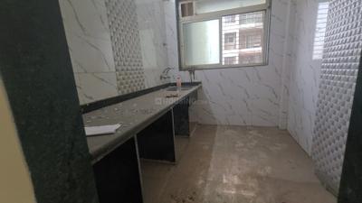 Kitchen Image of 920 Sq.ft 2 BHK Apartment / Flat for sale in Mohan Willows I, Badlapur East Badlapur for Rs. 3700000