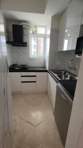 Kitchen Image of 895 Sq.ft 1 BHK Apartment / Flat for sale in Kashish Manor One, Sector 111 Gurgaon for Rs. 13500000