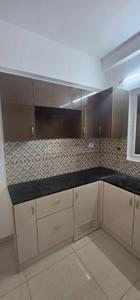 Kitchen Image of 800 Sq.ft 2 BHK Apartment / Flat for rent in Urbanrise Revolution One, Padur Chennai for Rs. 26000