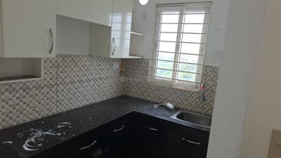 Kitchen Image of 600 Sq.ft 2 BHK Apartment / Flat for rent in Urbanrise Revolution One, Padur Chennai for Rs. 23000