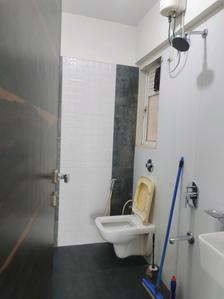 Common Bathroom Image of 600 Sq.ft 1 BHK Apartment / Flat for rent in Jadeite Charkop Nandanvan CHSL, Malad West Mumbai for Rs. 37000