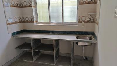 Kitchen Image of 650 Sq.ft 2 BHK Apartment / Flat for sale in Baghajatin Kolkata for Rs. 2800000