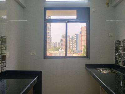 Kitchen Image of 700 Sq.ft 1 BHK Apartment / Flat for sale in Charms City, Titwala Thane for Rs. 3500000