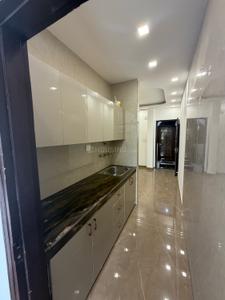 Kitchen Image of 400 Sq.ft 1 BHK Builder Floor for rent in Old Double Storey, Lajpat Nagar New Delhi for Rs. 27000