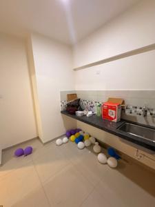 Kitchen Image of 600 Sq.ft 1 BHK Apartment / Flat for rent in Mahindra Happinest Tathawade, Tathawade Pune for Rs. 23000