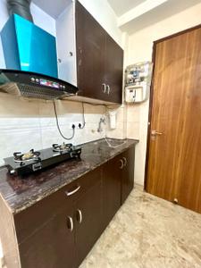 Kitchen Image of 900 Sq.ft 1 BHK Builder Floor for rent in Sector 52 Gurgaon for Rs. 30000