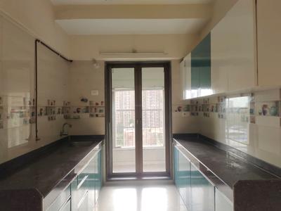 Kitchen Image of 950 Sq.ft 3 BHK Apartment / Flat for sale in Abhigna Avirahi Heights, Malad West Mumbai for Rs. 21800000