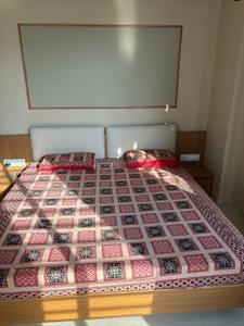 Bedroom Image of 1200 Sq.ft 2 BHK Apartment / Flat for sale in Aroma Tirupati Aakruti Greenz, Chharodi Ahmedabad for Rs. 8000000