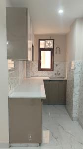 Kitchen Image of 700 Sq.ft 2 BHK Apartment / Flat for sale in ATFL JVTS Gardens, Chhattarpur New Delhi for Rs. 4500000