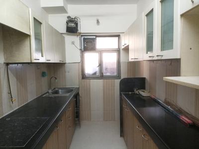 Kitchen Image of 665 Sq.ft 2 BHK Apartment / Flat for sale in Unique Poonam Estate Cluster 1, Mira Road East Mira Bhayandar for Rs. 10300000