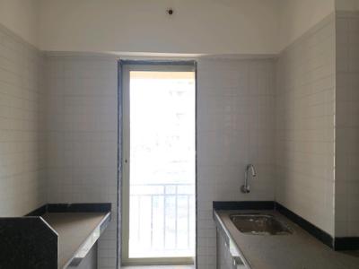 Kitchen Image of 790 Sq.ft 2 BHK Apartment / Flat for sale in Agarwal Vrindavan Gardens, Nalasopara East Nala Sopara for Rs. 7000000