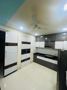 Kitchen Image of 1000 Sq.ft 3 BHK Apartment / Flat for sale in Sarjan Setu Vertica, Gota Ahmedabad for Rs. 11000000