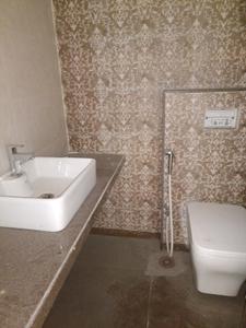 Common Bathroom Image of 1000 Sq.ft 1 BHK Apartment / Flat for sale in Metro Satyam Queens Necklace, Taloja Navi Mumbai for Rs. 6000000