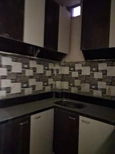 Kitchen Image of 980 Sq.ft 2 BHK Apartment / Flat for sale in Sector 49 Noida for Rs. 3000000