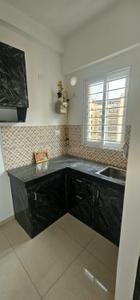 Kitchen Image of 663 Sq.ft 2 BHK Apartment / Flat for rent in Urbanrise Revolution One, Padur Chennai for Rs. 20000