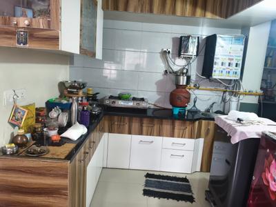 Kitchen Image of 550 Sq.ft 1 BHK Apartment / Flat for rent in Savvy Studioz, Gota Ahmedabad for Rs. 17500