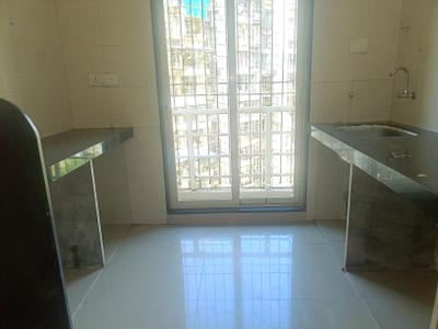 Kitchen Image of 709 Sq.ft 1 BHK Apartment / Flat for rent in Gajra Bhoomi Gardenia 1, Kalamboli Navi Mumbai for Rs. 17000