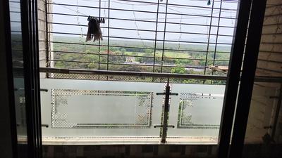 Living Room Image of 850 Sq.ft 2 BHK Apartment / Flat for sale in Giriraj Vrindavan Heritage, Kopar Khairane Navi Mumbai for Rs. 15000000