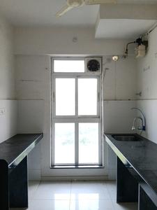 Kitchen Image of 650 Sq.ft 1.5 BHK Apartment / Flat for rent in Godrej Emerald, Kasarvadavali Thane for Rs. 27332